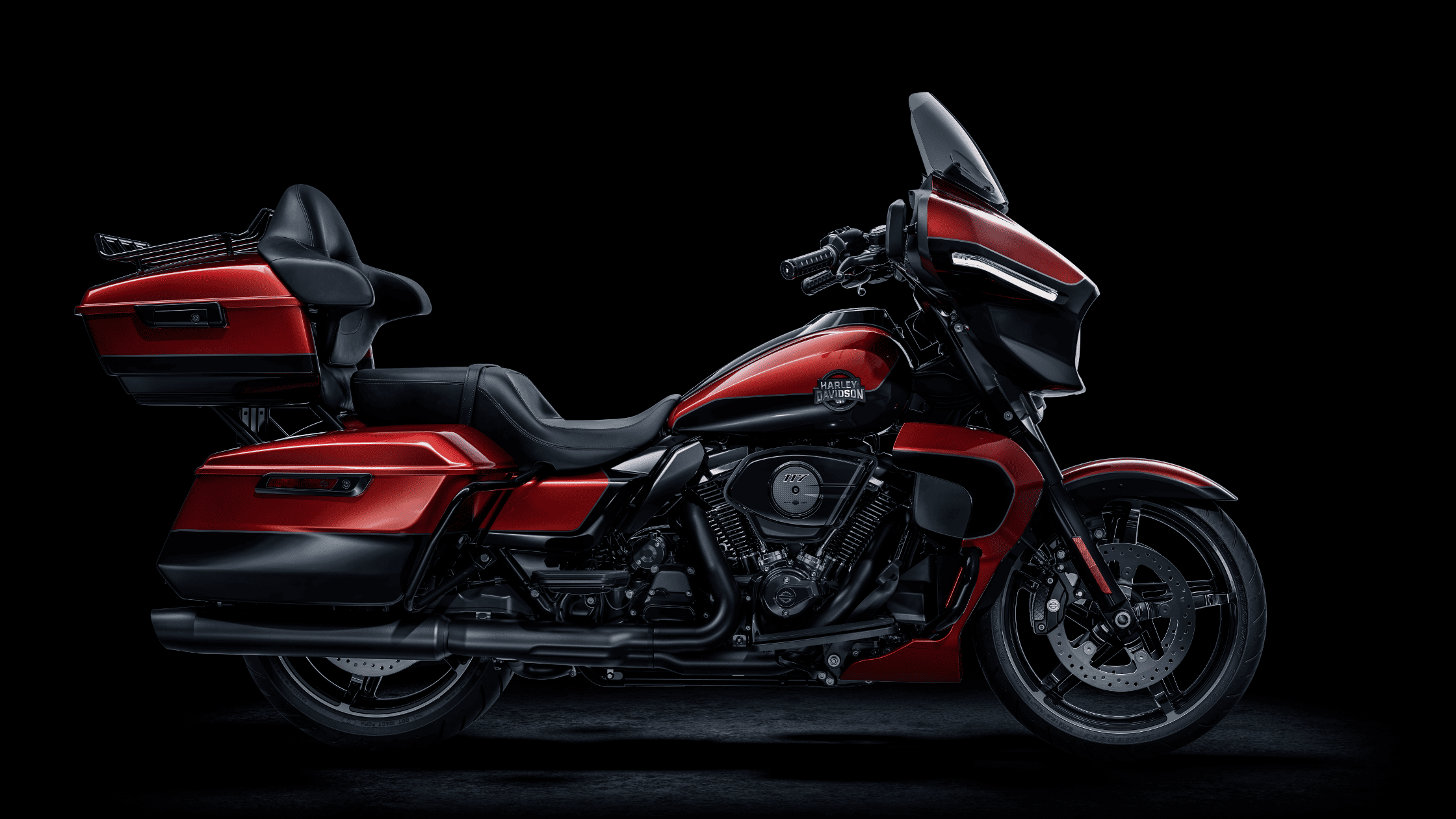 Red and black 2025 Harley-Davidson Street Glide Ultra with touring trunk and passenger backrest