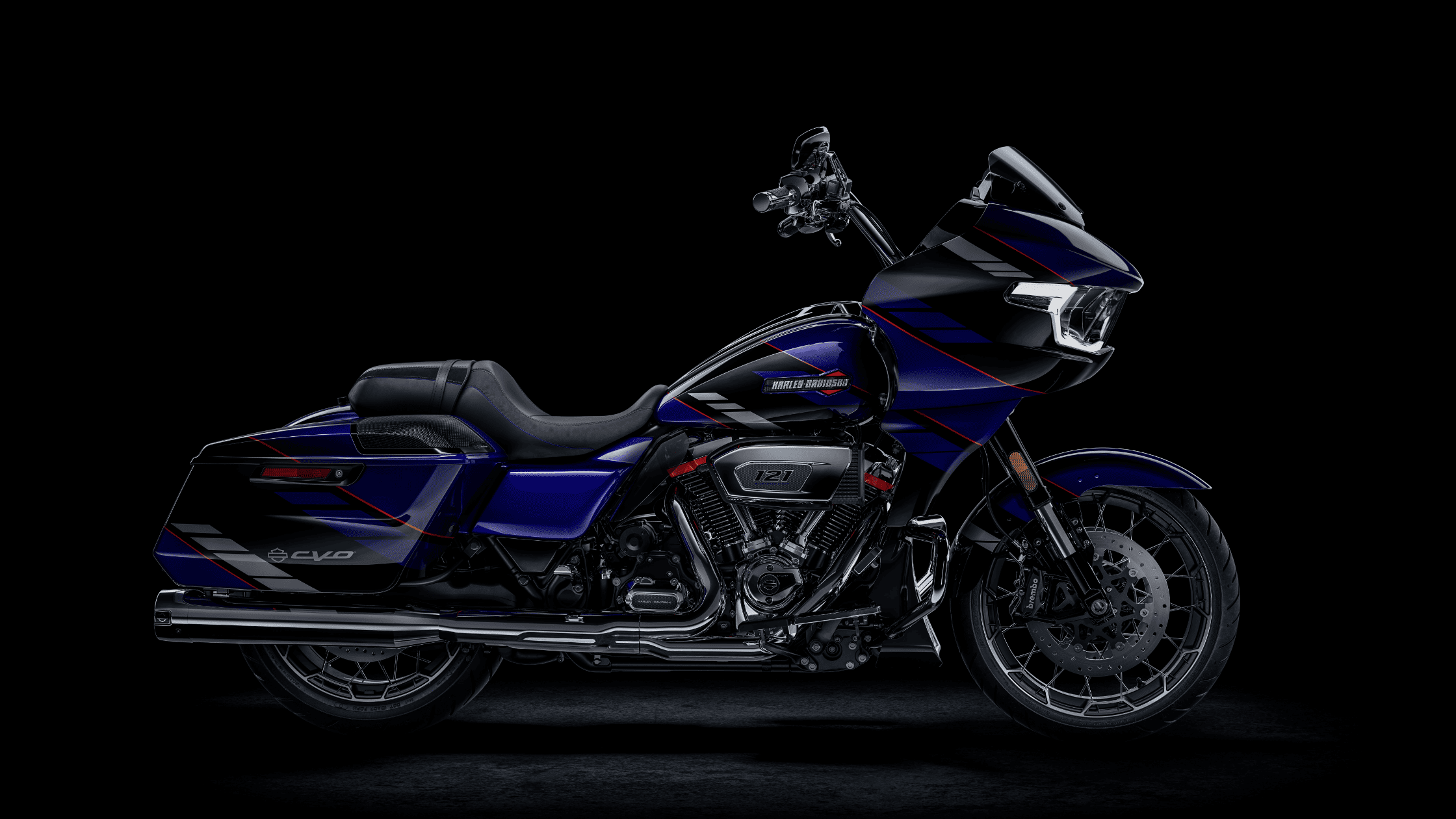Blue and black 2025 Harley-Davidson CVO Road Glide with custom graphics and chrome exhaust
