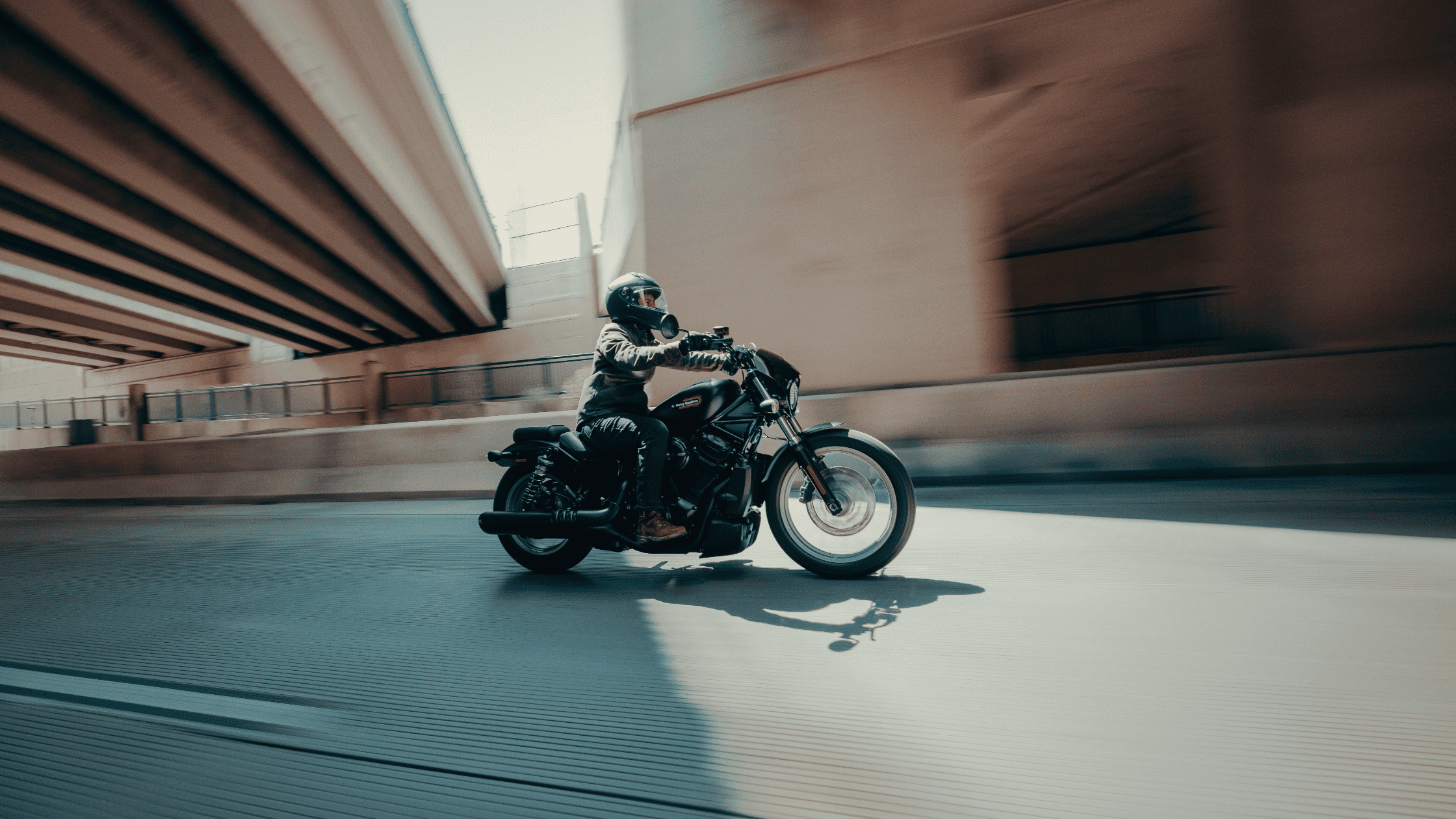 Rider moves through underpass on 2025 Harley-Davidson® Nightster® Special in urban city environment